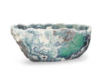 1431
A fluorite specimen bowl
20th/early 21st century
Including green, purple, and white banding
7.75" H x 18" W x 13" D
37.5 lbs.
Estimate: $300 - $500