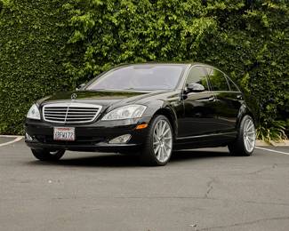 1495
A 2007 Mercedes-Benz S-Class S550
VIN: WDDNG71X27A140793; Plate: 6BFW172
Black exterior with black leather and wood paneling interior
35,1XX miles
5.5 liter, V8 engine
7-speed automatic transmission, rear wheel drive
Radio, 6-CD player/changer, Command Navigation System with CD
Sunroof and cell phone keypad
Spare tire and tire changing kit, lacking manual
Estimate: $5,000 - $7,000