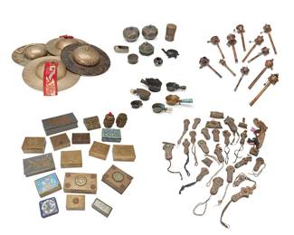 1393
A group of Asian ceremonial and decorative objects
19th/20th century; Tibet or greater Vajrayana Diaspora
Comprising 11 handheld prayer wheels, 4 liturgical cymbals (each: 10" Dia.),18 silver repoussé and leather Tibetan healer's acupuncture needle cases, some with coral or turquoise accents, 6 Chinese silk irons, an assortment of 6 mostly brass Asian tea caddies and 14 other boxes, some with inset cabochon stones, carved hardstone accents, or cloisonné/champlevé enamel decoration, and 6 other miscellaneous items
Approximately 59 items
Cymbals: 10" Dia. approx.; Longest prayer wheel: 13.25" L
Estimate: $700 - $900