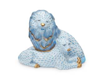 1357
A Herend porcelain fishnet lion figural group
Late 20th/early 21st century
Stamped to underside: Herend / Hungary / Handpainted; further marked: 15352/VHB / J / 92; further impressed and incised with indecipherable numbers
Depicting a lion and lioness in the blue 'fishnet' pattern with gilt accents
7" H x 8.625" W x 4.75" D
Estimate: $300 - $400