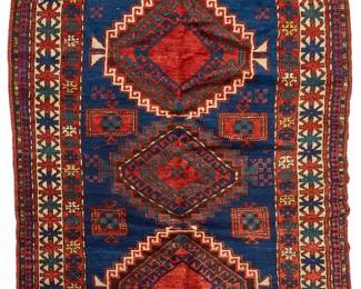 1415
A Caucasian area rug
20th century
Wool on wool foundation
6' 8" L x 4' 5.5" W
Estimate: $250 - $350