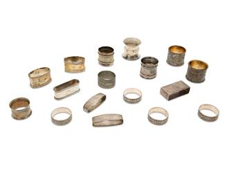 1353
A group of silver and metal napkin rings
Late 19th/20th century
Some marked for sterling; eight XRF tested for sterling, two for .800 silver
Comprising eight sterling silver rings, two .800 silver rings, and seven rings plated or of mixed metal alloys
17 pieces
Weighable silver: 7.7 oz. troy approximately
Estimate: $100 - $150