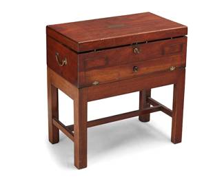 1381
An English mahogany traveling engraver's chest
Late 19th/early 20th century
The lidded chest with brass hardware, locking mechanism, and opposed handles, set on a stand, the interior fitted with multiple compartments housing tools and implements for steel-plate engravings, above a single hinged front door
Chest: 7" H x 20.5" W x 11.25" D; Overall: 21" H
Estimate: $300 - $500
