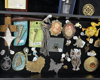 Costume brooches and pendants