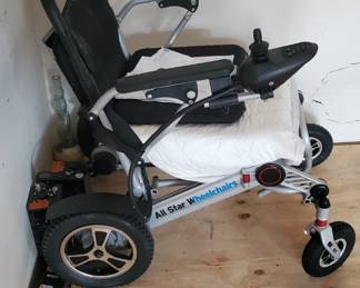 Motorized wheel chair