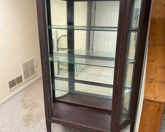 Curved glass curio cabinet