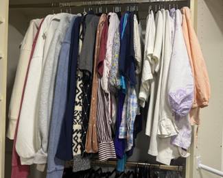 Women's clothing including sweaters, tops, golf shirts