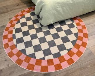 Circular washable rug, 6' diameter, checker pattern
