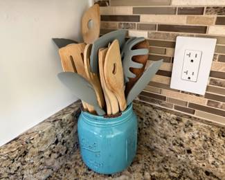 Cooking utensils, plastic and wood, in Bell jar