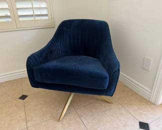 West Elm blue velvet swivel chair