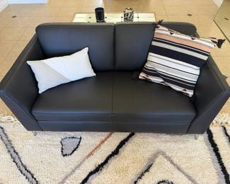 Copenhagen love seat, black leather, 62 l x 32.5 w x 31.5 inches