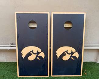 Custom-made wooden Iowa Hawkeyes cornhole boards and bags