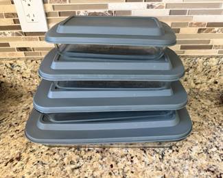 Four (4) deep glass banking dishes with plastic lids