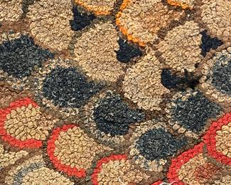 CLAM SHELL HOOKED RUG.