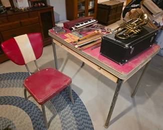 Vintage red Formica kitchen table with one chair. 