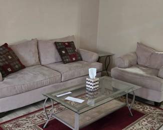 Sofa and oversized chair.  Glass coffee table and 2 end tables