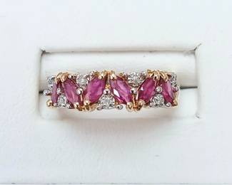 Ruby and diamond band in 14k yellow gold. Approx sz 6.75