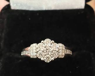 10k white gold diamond ring that sits a little high Approx sz 4.75