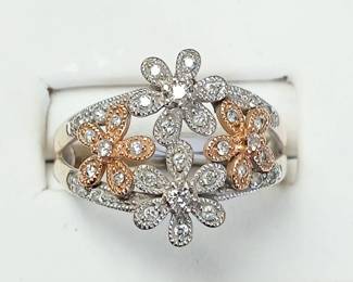 Floral diamond ring in 14k white and rose gold. Approx sz 9.5