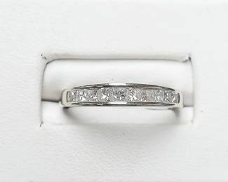 Princess cut diamond band 1.00ct tw in 14k white gold. Approx sz 6.5