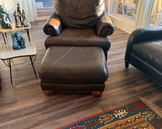 Brown leather chair with ottoman