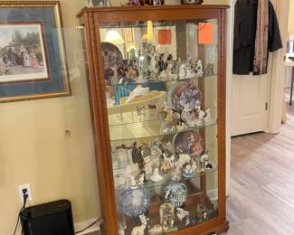 glass front cabinet, she loved her kitties
