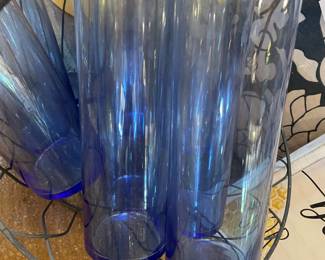 20 blue glass tall candle votives. $3 each. Must buy a min of 10. These were used at a wedding.