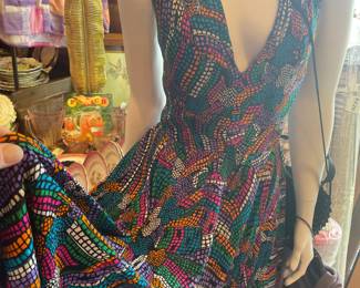 We have stunning designer gowns and clothing. All at a fraction of Wayzata prices! Silk gown, Size 6 $150