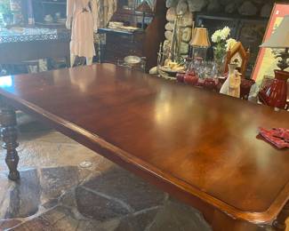 This Bernhardt table also has 8 matching chairs and 2 additional leaves with custom protective pads. $1,200.