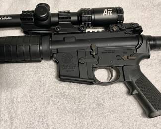 Cabela's AR scope included and does have the magazine shown in later photos.