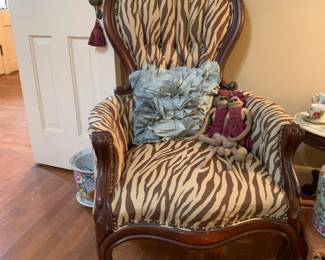 Brown and cream zebra upholstered antique arm chair 