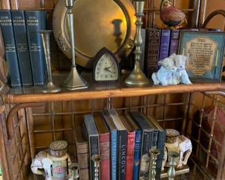 brass accents, bookends, books 