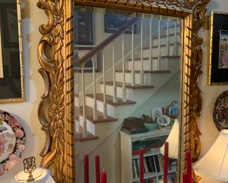 Gold framed wall mirror