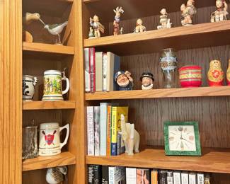 Hummels, Royal Doulton and other collectibles, Beatles books, signed bird carvings