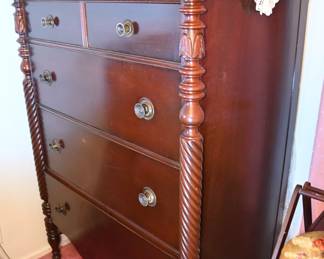 Carved mahogany spool spindle dresser