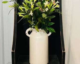 Pouting Wooden Chair With Ceramic Vase Of Flowers 