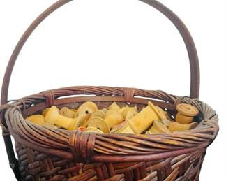 Large Woven Basket Filled With Vintage Wooden Spools 