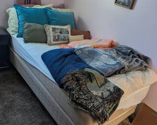 Blankets and pillows
Bed