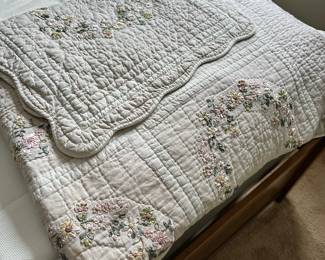 Hand embroidered comforter