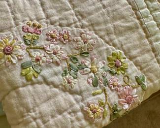 Hand embroidered comforter