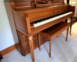 Beautiful walnut piano,well cared for. Manufactured by Cable