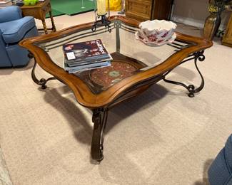 Beveled glass and wood framed coffee table 
