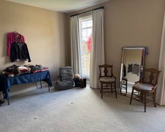 Ladies' clothing, antique chairs, floor mirror