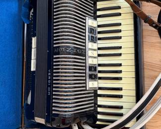 Vintage Hohner Verdi lllm accordian with case