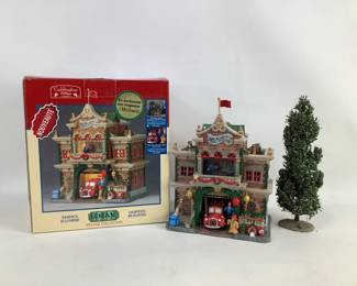 Christmas village house with tree