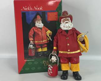 Santa claus firefighter figurine