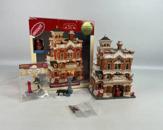 Christmas village house and figurines