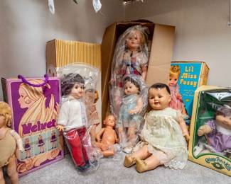 Various vintage dolls, some like new, some lovingly used