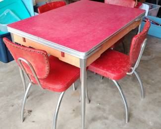 50's draw leaf dining set. Chair vinyl sticky surface needs treated. Missing one chrome support on one leg