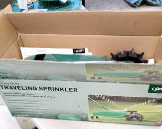cast iron traveling sprinkler by orbit